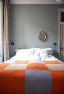 brita-sweden-throw-pop-orange-bed